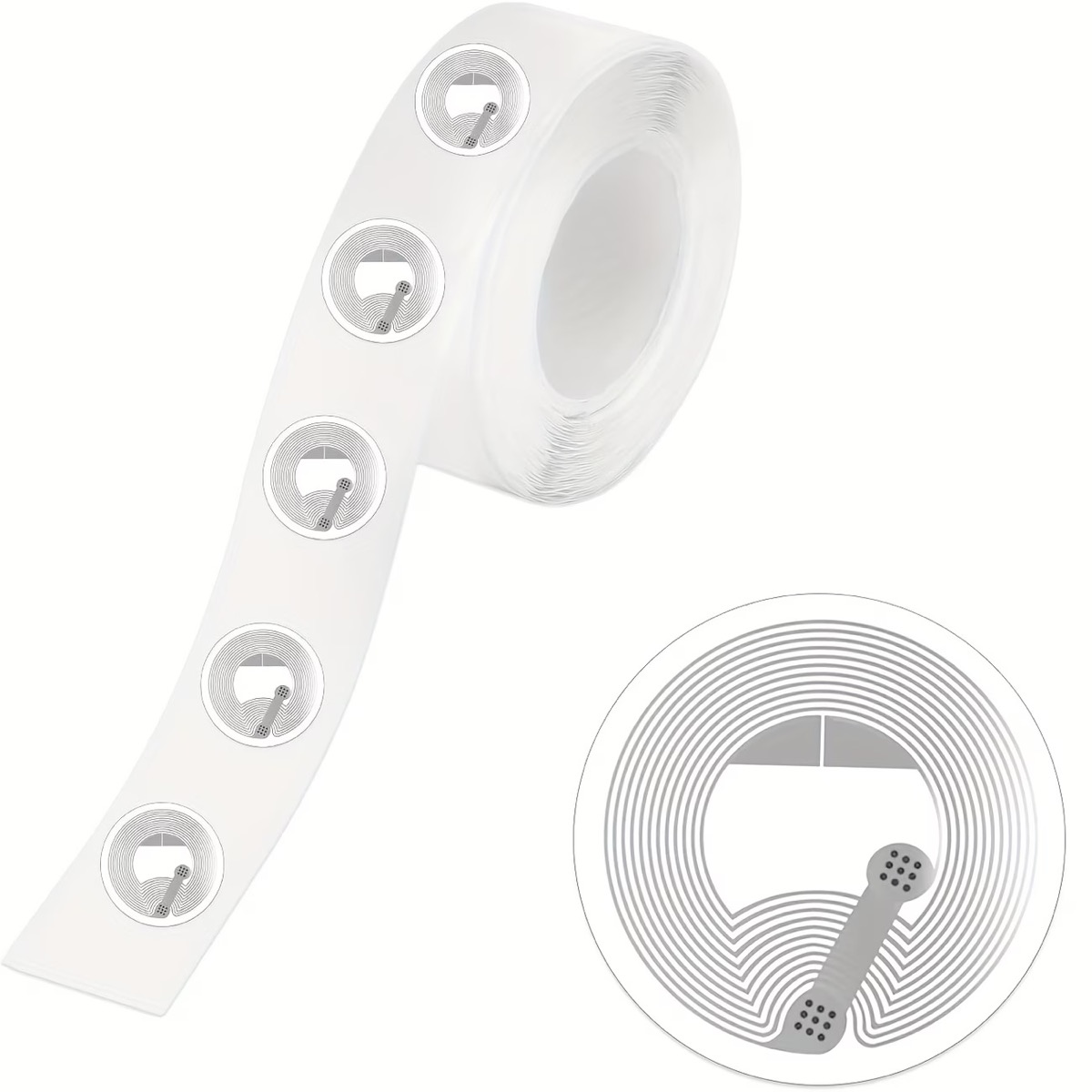 A roll of tap stickers, each a small disc with the chip and antenna coil visible inside